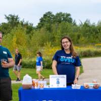 Lakers with cider and donuts at the dog park.